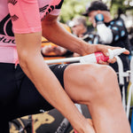 A photo of a rider for EF Education First applying Pelotan, the world's best performance sunscreen.