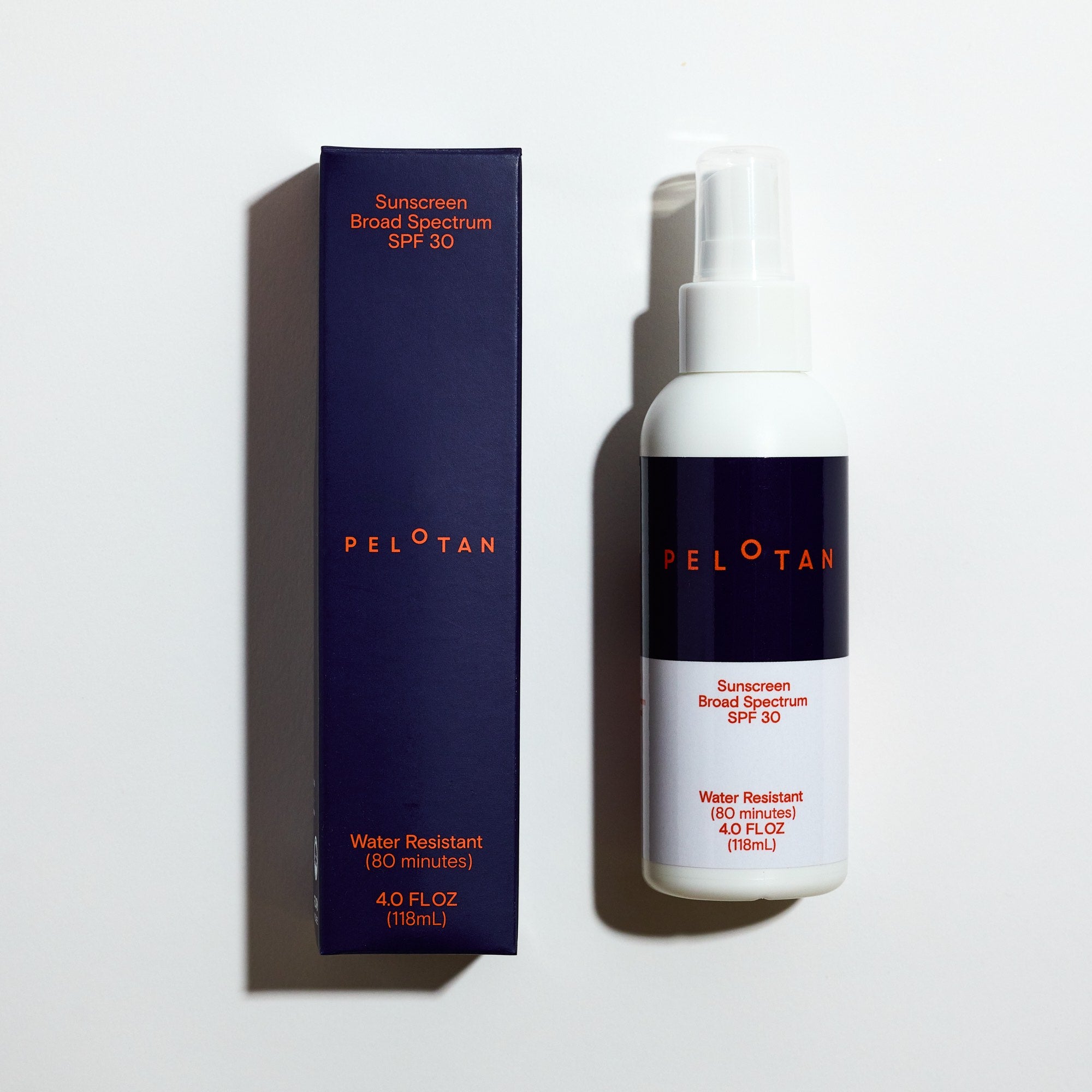 Peloton sunscreen spray bottle and packaging on a white background