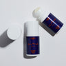 Two bottles of Pelotan roll-on product on a white background