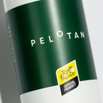 A closeup of the Pelotan Apres recovery balm bottle, showing that this is a special edition with the Tour de France.