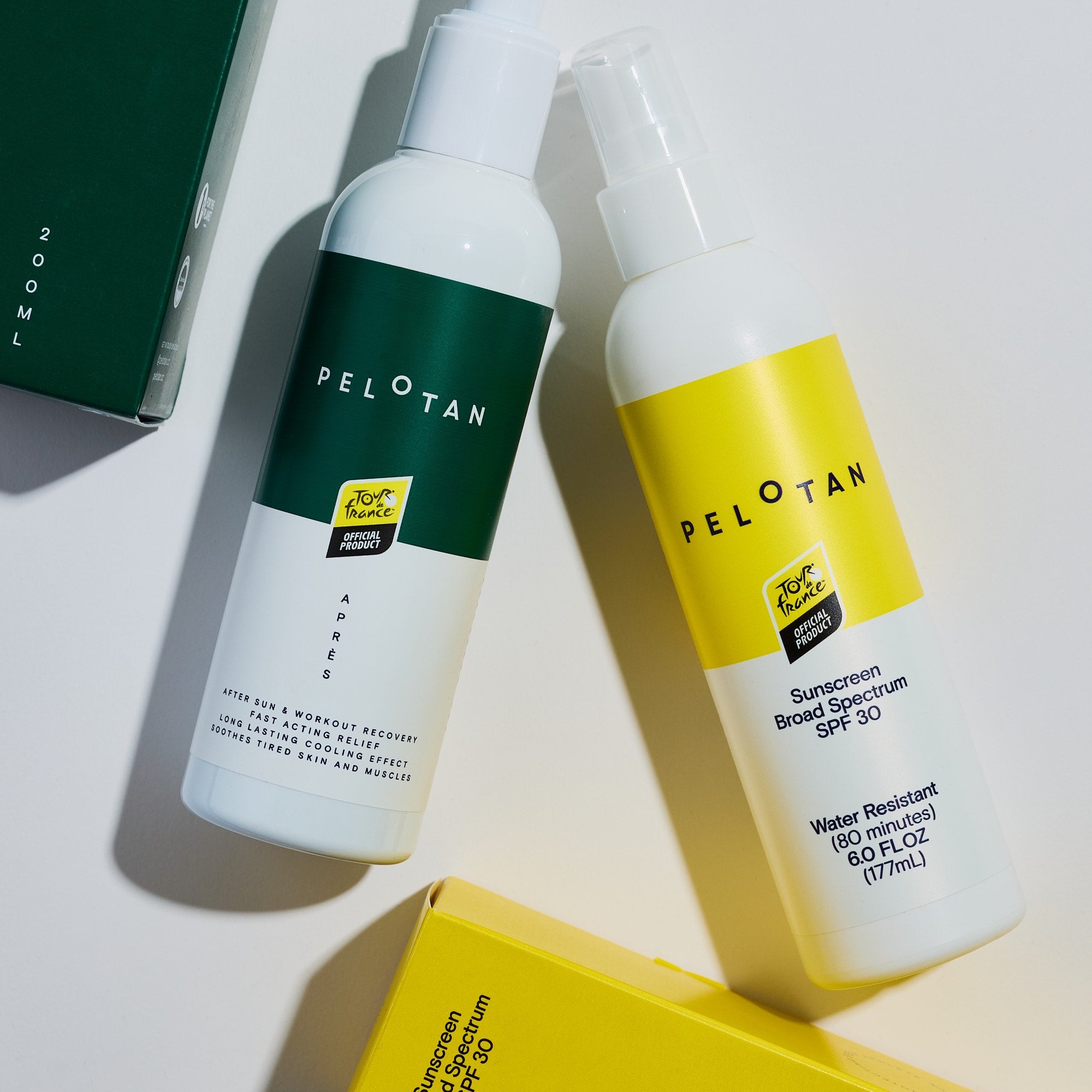 Two bottles of Peloton skincare products on a light background