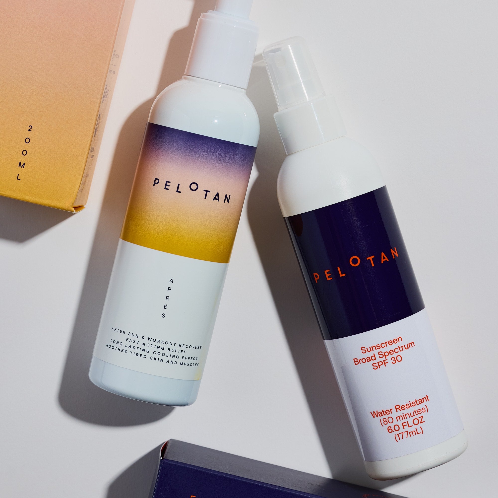Two bottles of Pelotan skincare products on a light background