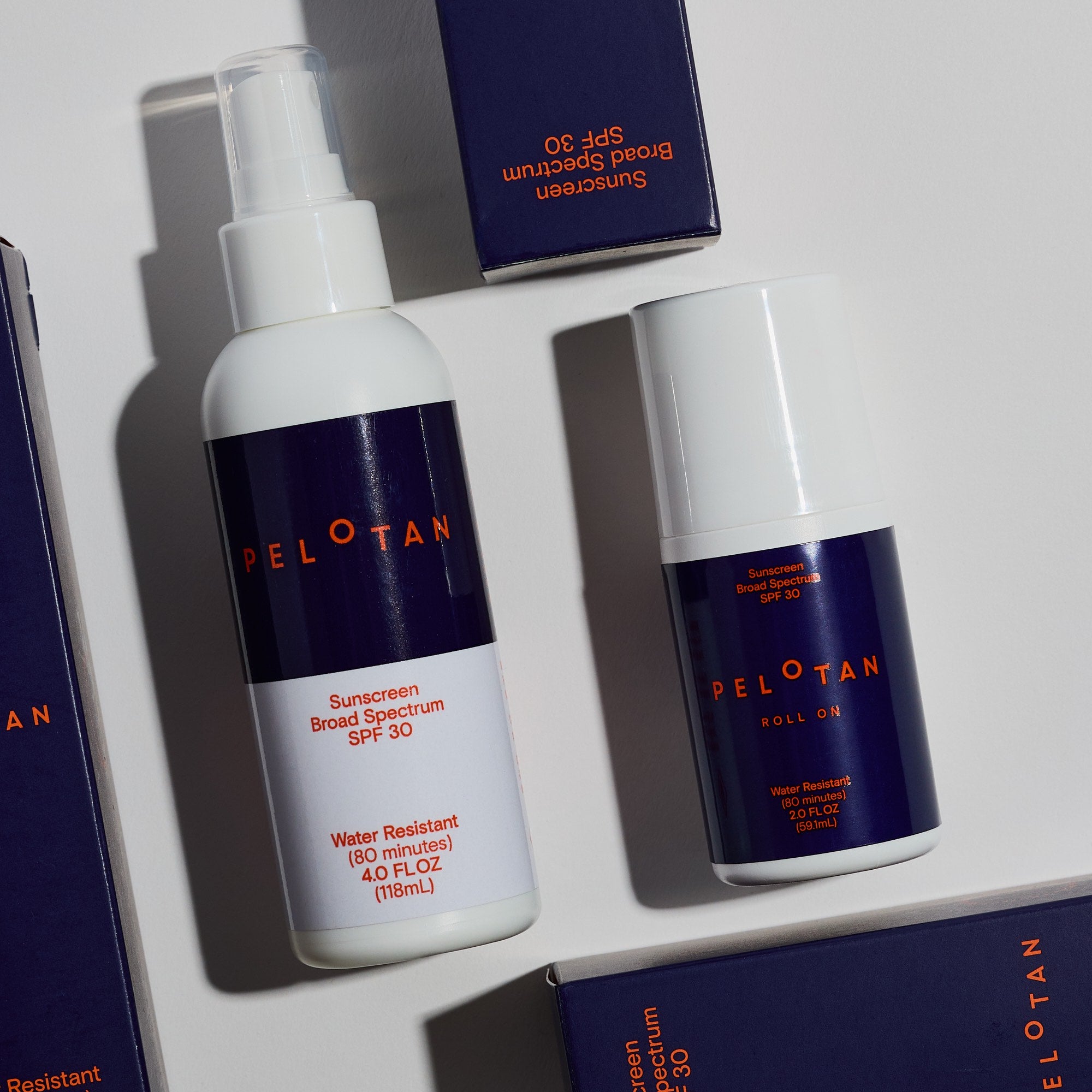 PELOTAN sunscreen bottle and roll-on on a white background