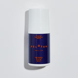 Peleton roll-on sunscreen bottle on a light gray background
