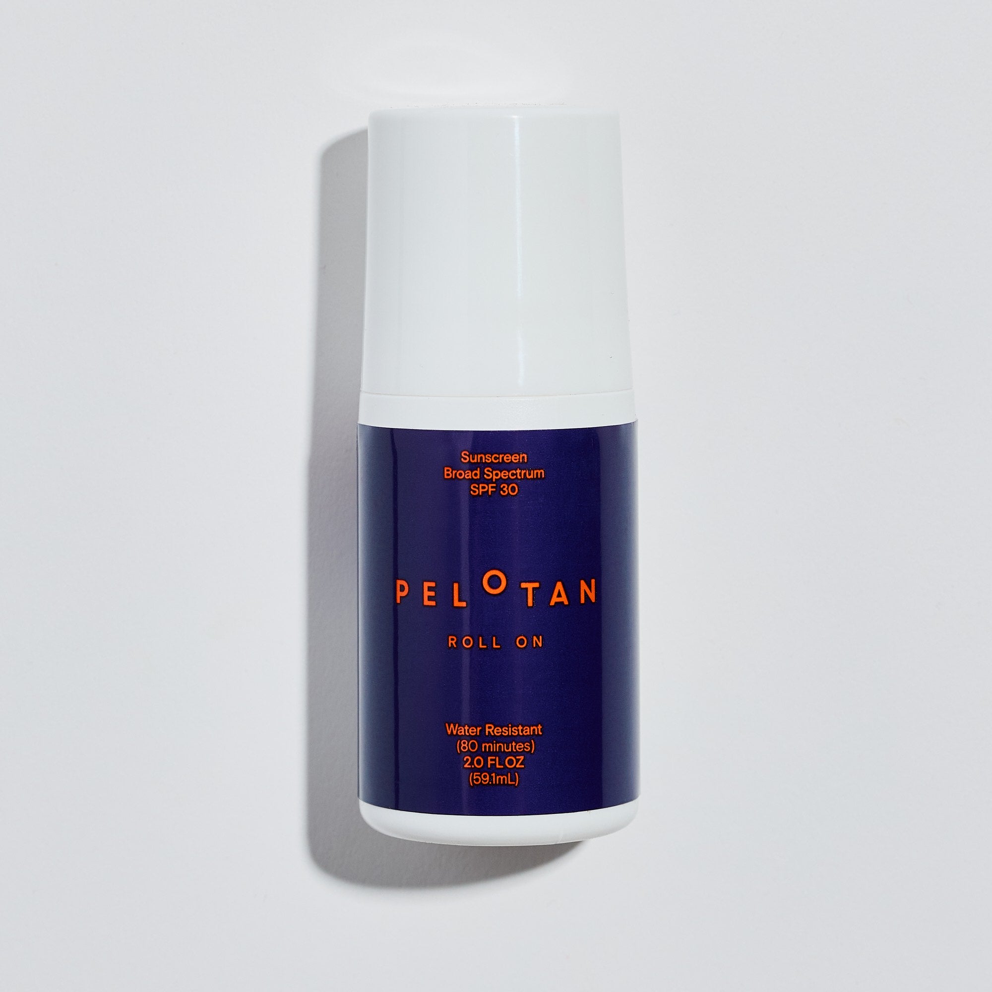 Peleton roll-on sunscreen bottle on a light gray background