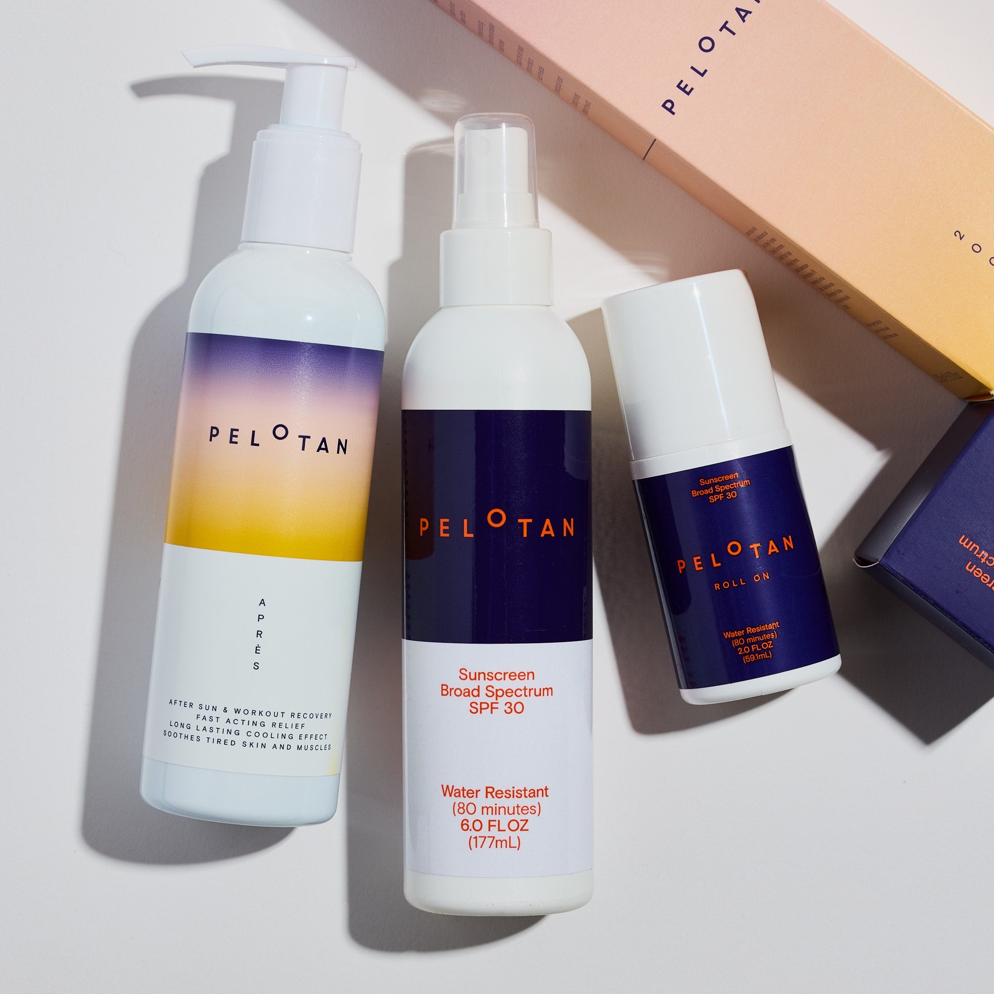 Pelotan sunscreen products including a pump bottle, spray bottle, and roll-on on a light background.