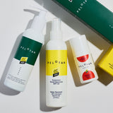 Three Pelotan sunscreen products on a white background