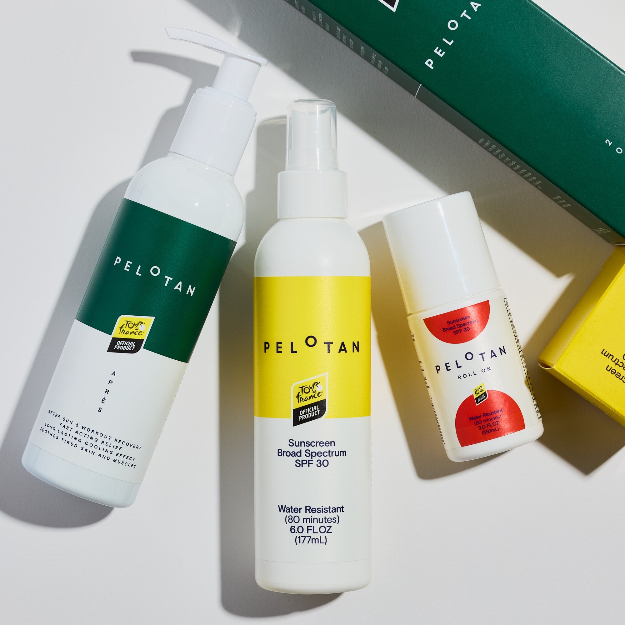 Three Pelotan sunscreen products on a white background